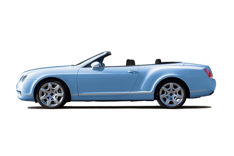Light blue exclusive cabriolet with open top isolated on whte
