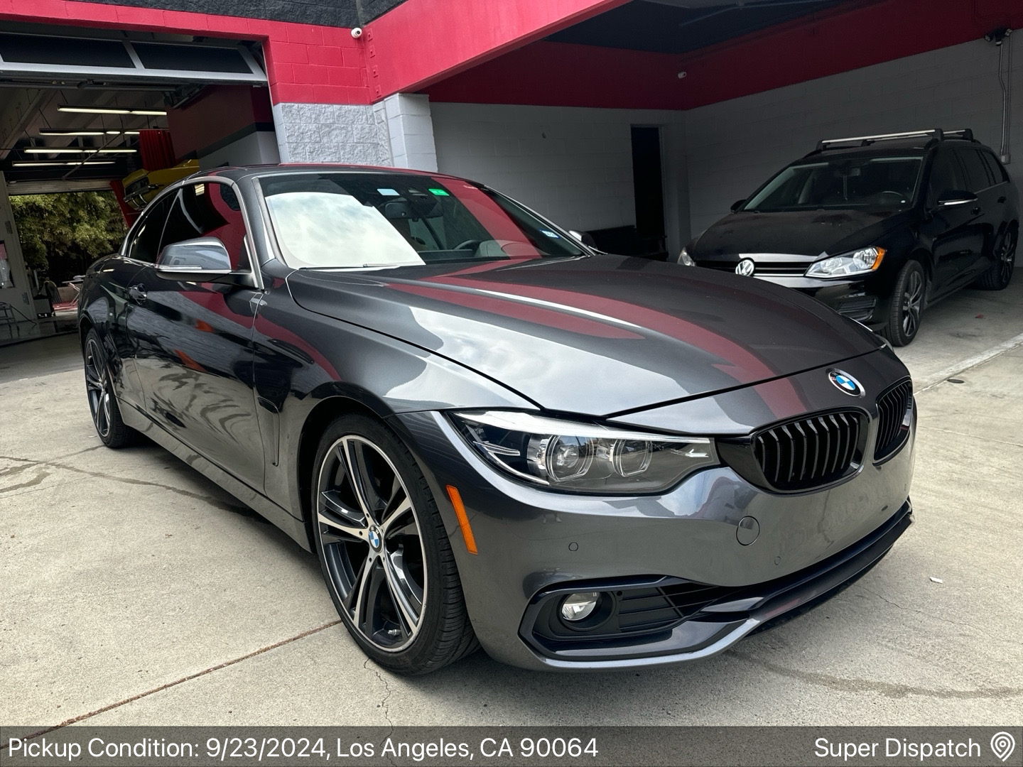 Car on open carrier - Auto Transport Professionals