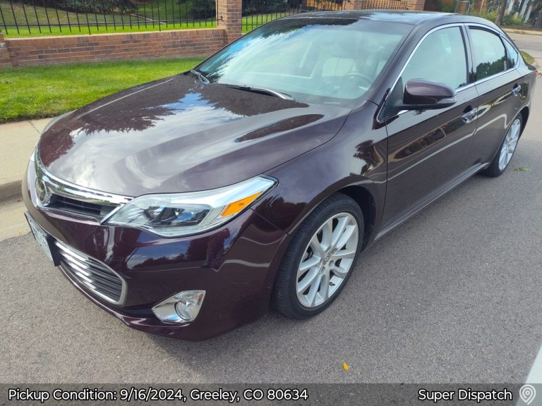 Maroon Toyota Avalon picked up in Greeley, CO 80634 by Auto Transport Professionals on 9/16/2024