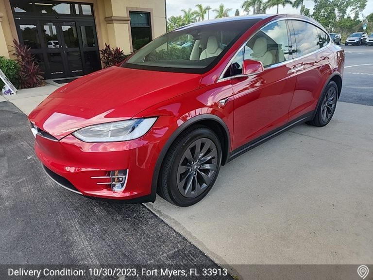 Red Tesla Model X delivered to Fort Myers, FL 33913 by Auto Transport Professionals.