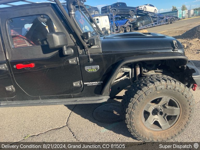 Black Jeep Wrangler delivered to Grand Junction, CO 81505 by Auto Transport Professionals on 8/21/2024.