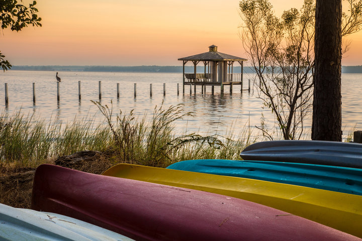 Kayaks besides the water, located in Fairhope, Alabama