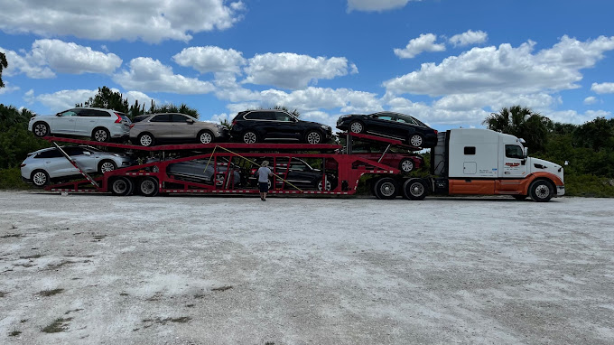 Car loaded on transport trailer - ATP